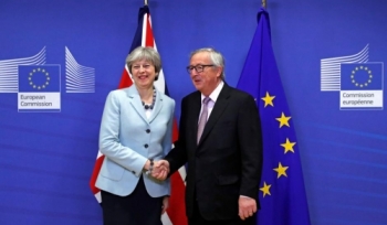 UK Prime Minister May and European Commission President Juncker
